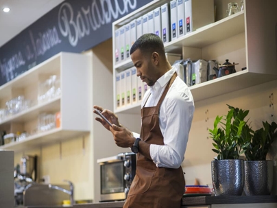 a business owner looking at a tablet